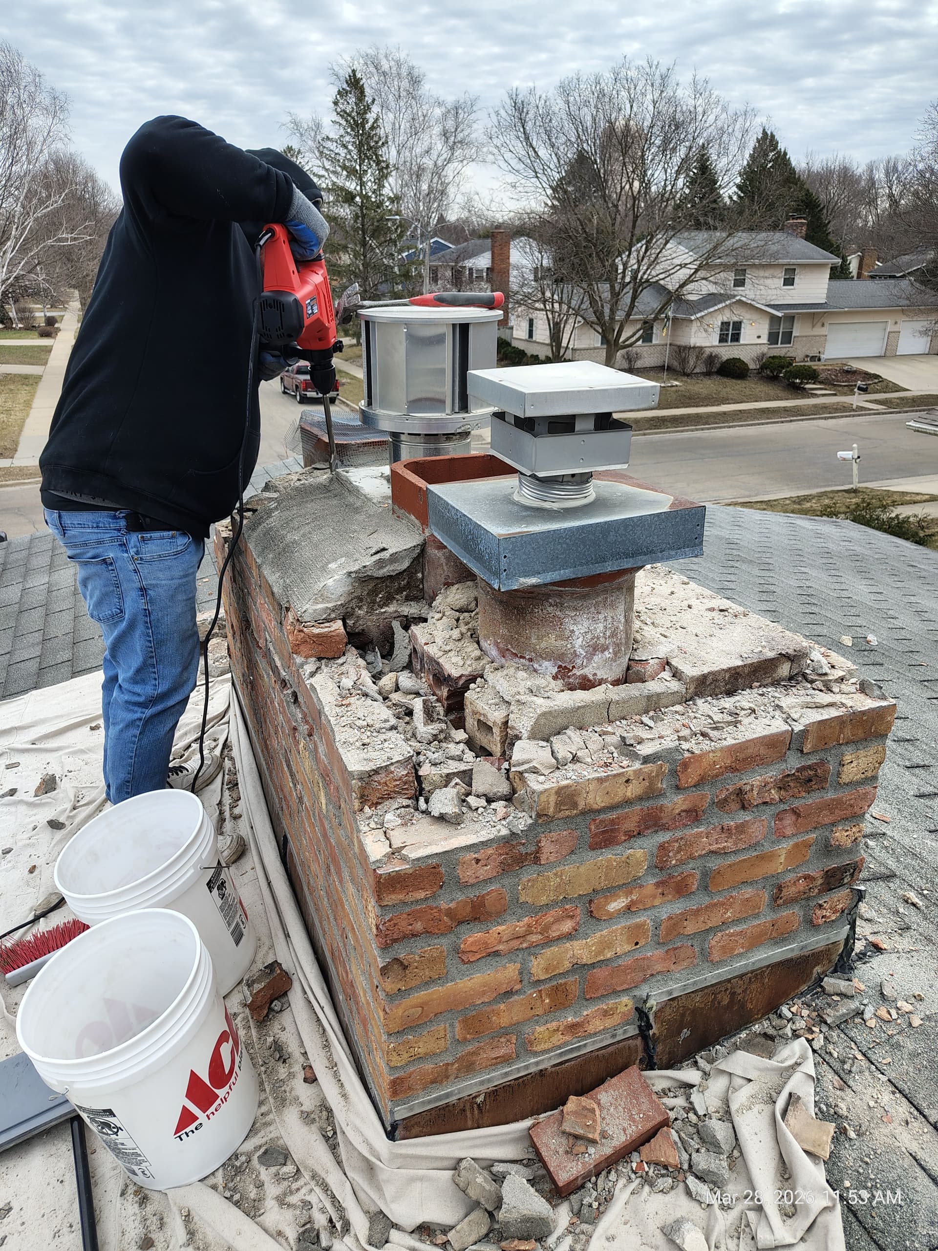 Chimney Rebuild From the Roofline Up - Brick by Brick image