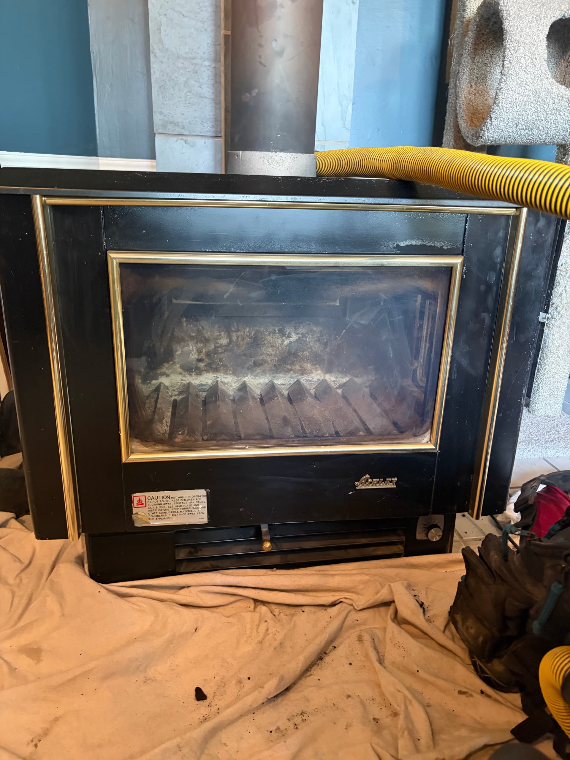 Gallery photos for Wood Stove Chimney Relining with New Stove Pipe and Fresh Repaint: Image #1
